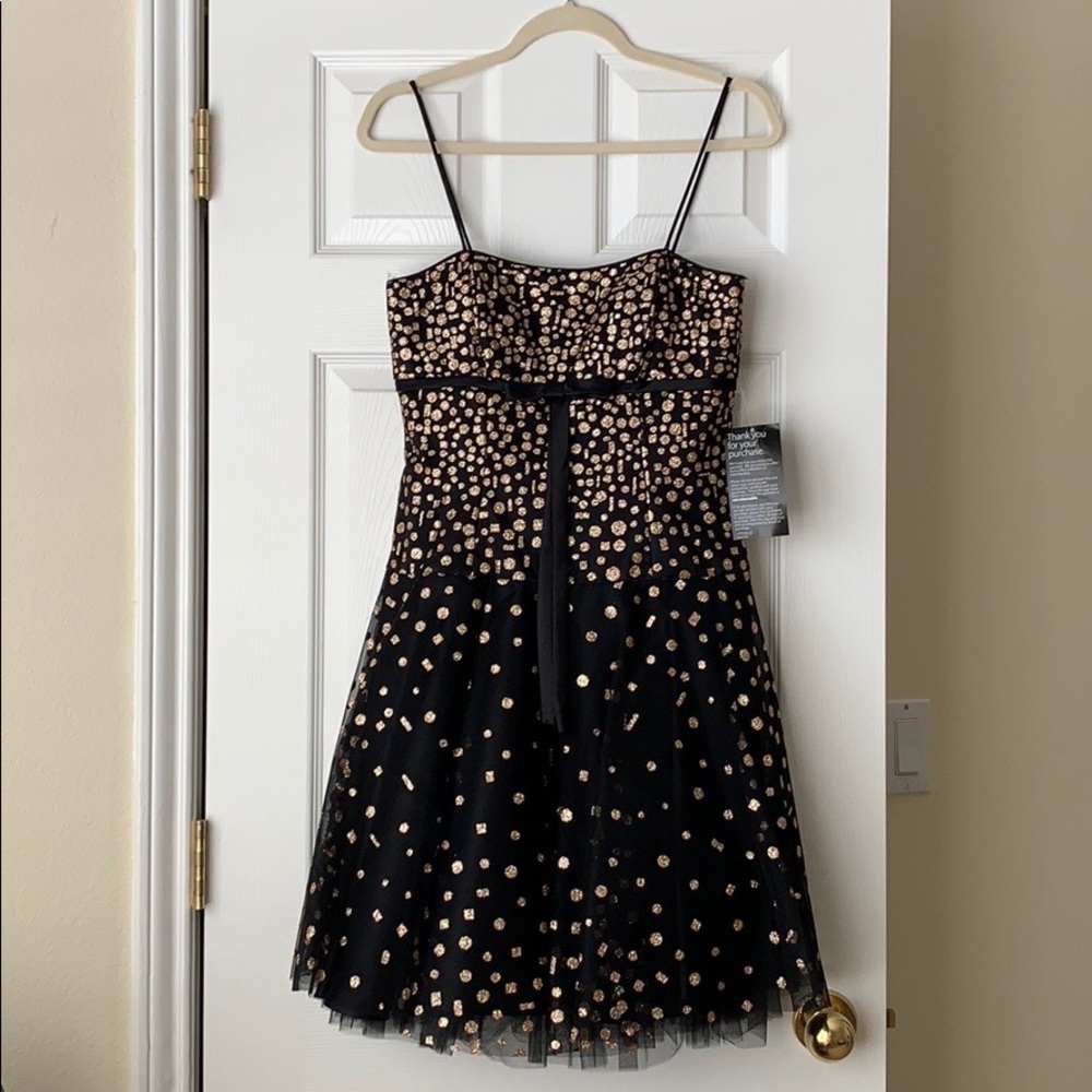 Black formal dress with gold accent